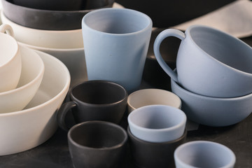 Matt ceramic handmade tableware in a workshop closeup