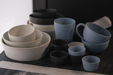 Obraz na płótnie Canvas Matt ceramic handmade tableware in a workshop closeup