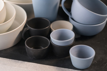 Matt ceramic handmade tableware in a workshop closeup