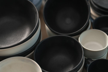 Obraz na płótnie Canvas Matt ceramic handmade tableware in a workshop closeup