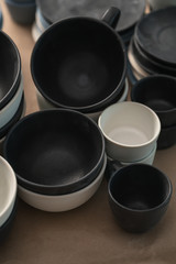 Matt ceramic handmade tableware in a workshop closeup