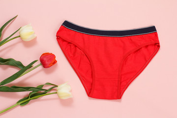 Beautiful women's cotton panties on a pink background.