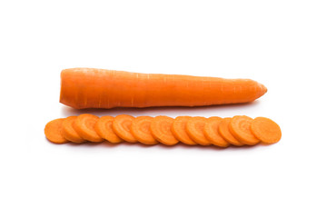 Carrots on a white background. Useful vitamins in vegetables. Food for vegetarians.