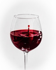 red wine on a white background