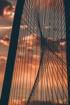 Low Angle View Of Suspension Bridge Against Sky