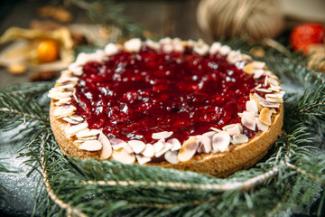 Appetizing sweet dessert cheese cake with berries jam