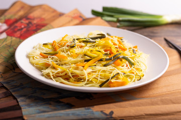Rice noodles with vegetables. Traditional Asian dish