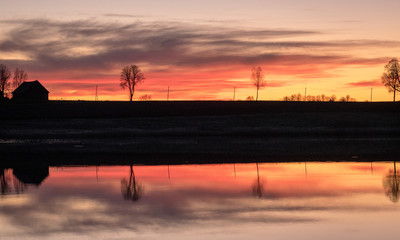 beautiful sunset by the lake, bright colors