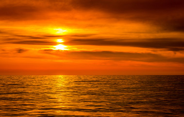 Bright colorful sunset over a calm sea