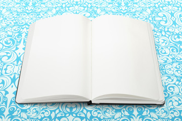 Opened book with blank pages on pattern background. illustration to showcase your artwork presentation.