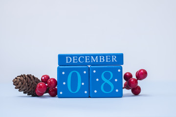 A seasonal clean Christmas-themed scene with calendar blocks for 8 December date
