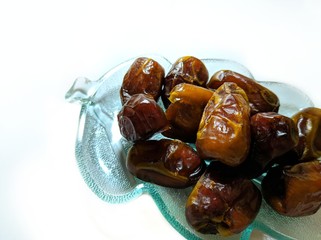 date palm on a plate isolated on white background