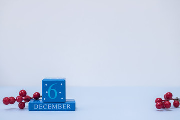 A seasonal clean Christmas-themed scene with calendar blocks for 8 December date