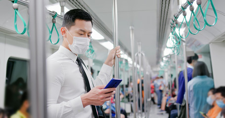 man with mask in mrt