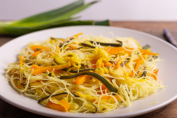 Rice noodles with vegetables. Traditional Asian dish