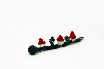 Crochet houses and trees bracelet isolated