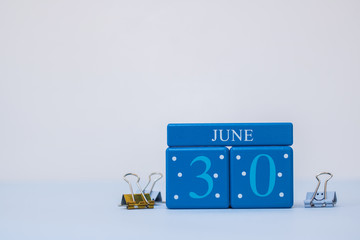 A calm scene with calendar blocks for 30th June