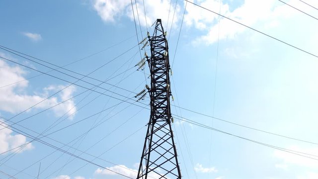 Long-distance power transmission lines. High-voltage poles that efficiently transmit thousands of kilovolts of electricity between cities