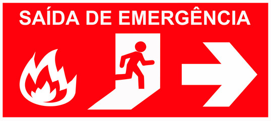 A signboard that says in Portuguese language : SAIDA DE EMERGENCIA.