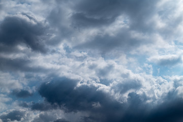 Light in the Dark and Dramatic Storm Clouds background,before the rain