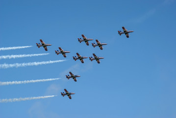 Squadron of military airplanes flying in formation