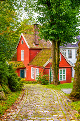 Bergen, Norway - Reconstructed XIX century Norwegian city street with wooden houses in Old Bergen Museum - Gamle Bergen Museum - heritage park
