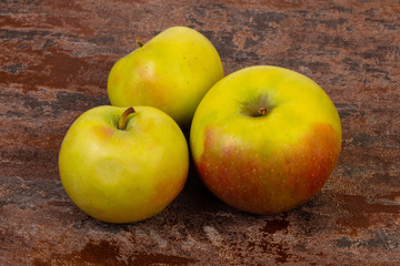 Ripe apples over background