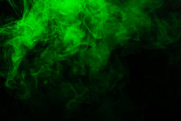 Obraz na płótnie Canvas Green steam on a black background.