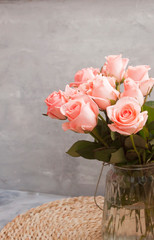 Delicate pink roses in vase