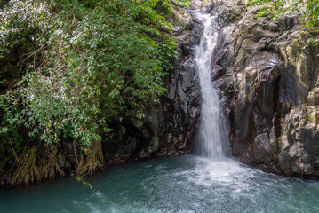 Fototapeta na wymiar Balinese Waterfall in Central Bali, Indonesia