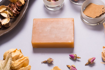 Brown milk handmade soap on grey background