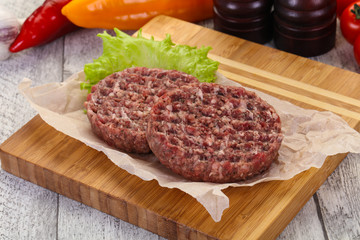 Raw burger cutlet