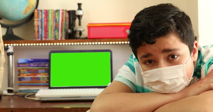 Home Isolation Concept  Epidemic Infection Covid-19 Distance Education At Home With Green Screen Laptop Monitor