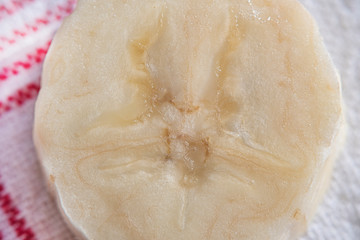 Closeup shot of a sliced banana slice