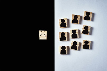Concept of racism and misunderstanding between people, prejudice and discrimination. Wooden block...
