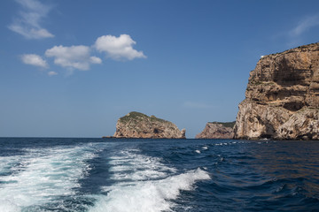 Fototapeta na wymiar Cliffs and island Isola Foradada, Sardinia