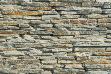 Stonework facade of the castle, old building.