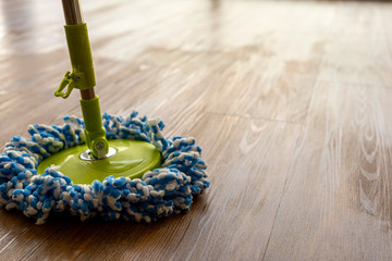 max mopping to finish last step of vinyl floor tiles installation 