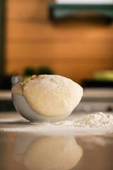 Fresh bread dough on white  kitchen table
