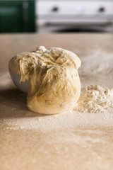Fresh bread dough on white  kitchen table