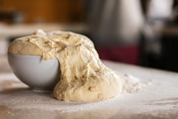 Fresh bread dough on white  kitchen table