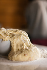 Fresh bread dough on white  kitchen table
