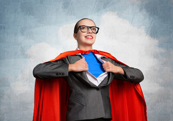 Happy business woman super heroine