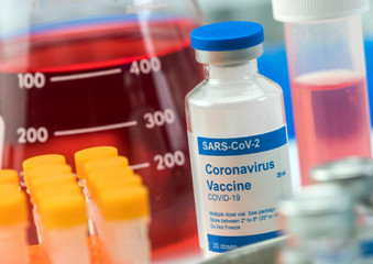 Coronavirus covid-19 experimental vaccine in a laboratory, conceptual image