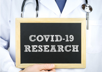 Covid-19 research - chalkboard message