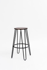 wooden bar stool with black iron legs