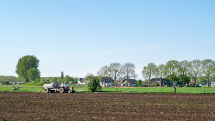 Fototapeta premium Tractor stand in Dutch landscape