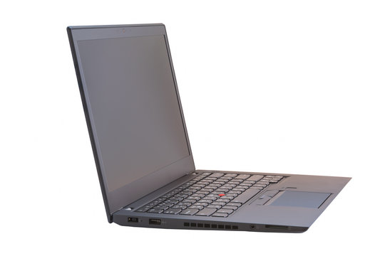 Side view of black laptop with black screen isolated on white background