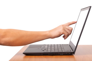 Man's hands pointing on screen laptop for business at office desk