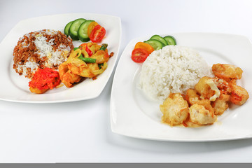 Turmeric fried chicken ayam goreng kunyit black sauce rice and butter chicken rice